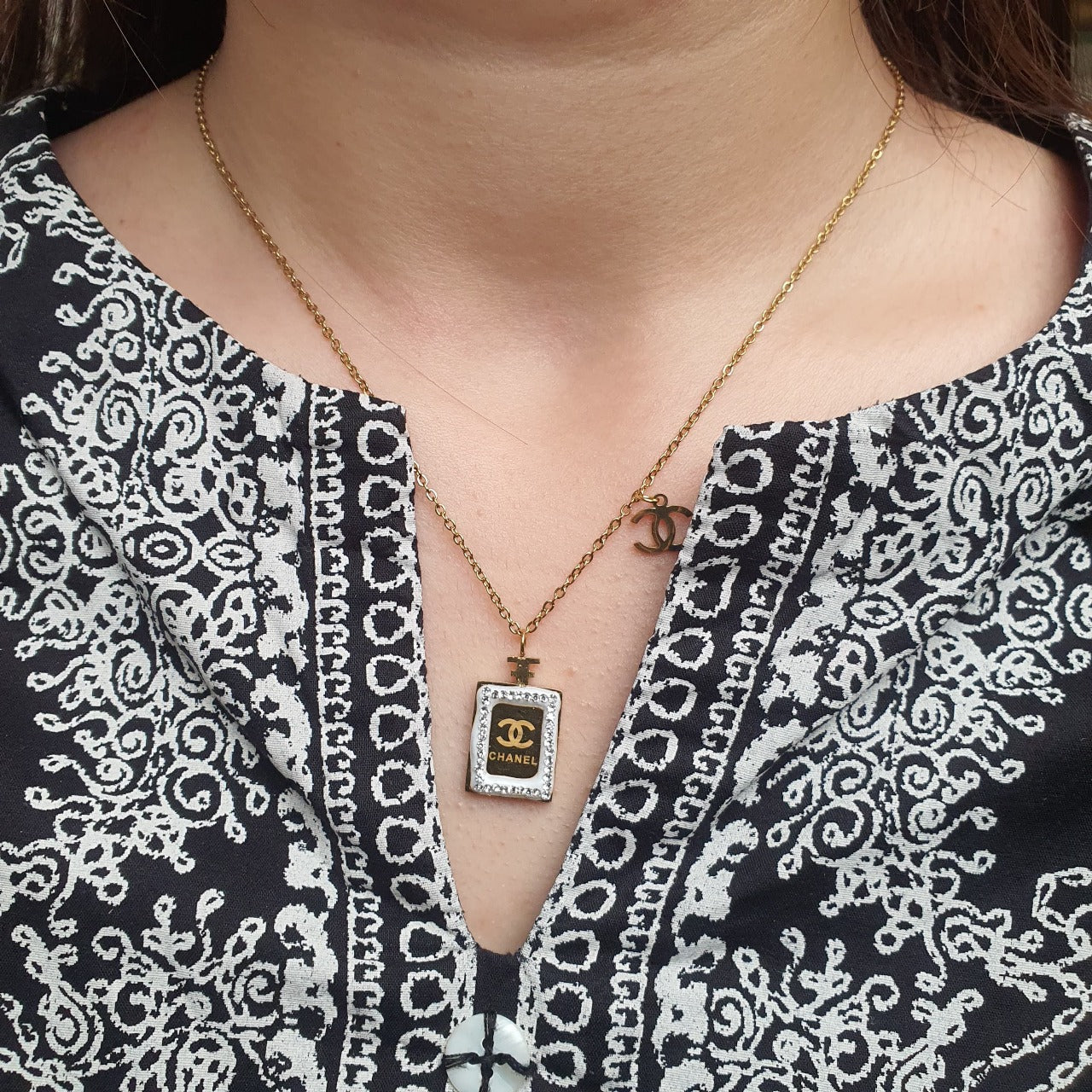 A delicate pendant designed to hold cherished memories close to the heart image 1