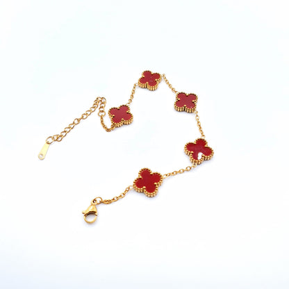 A delicate golden chain bracelet adorned with elegant flower-shaped motifs for a timeless, feminine touch. image 3