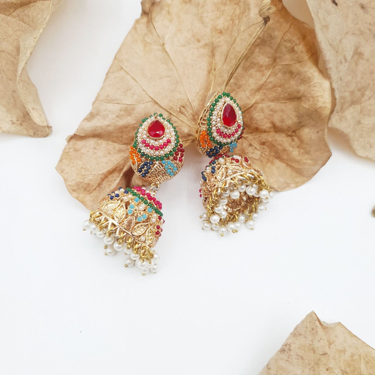Discover timeless elegance with our Regal Pearldrop Jhumka Collection image 19