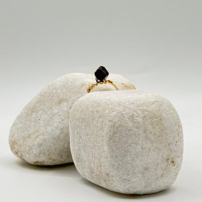 handcrafted gold ring with a deep black stone image 3