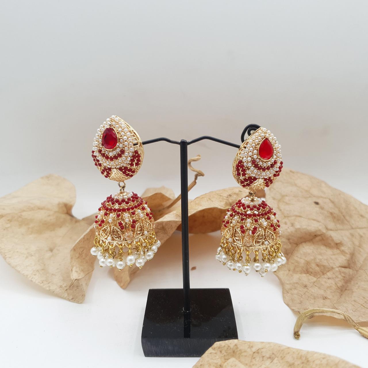 Discover timeless elegance with our Regal Pearldrop Jhumka Collection image 7