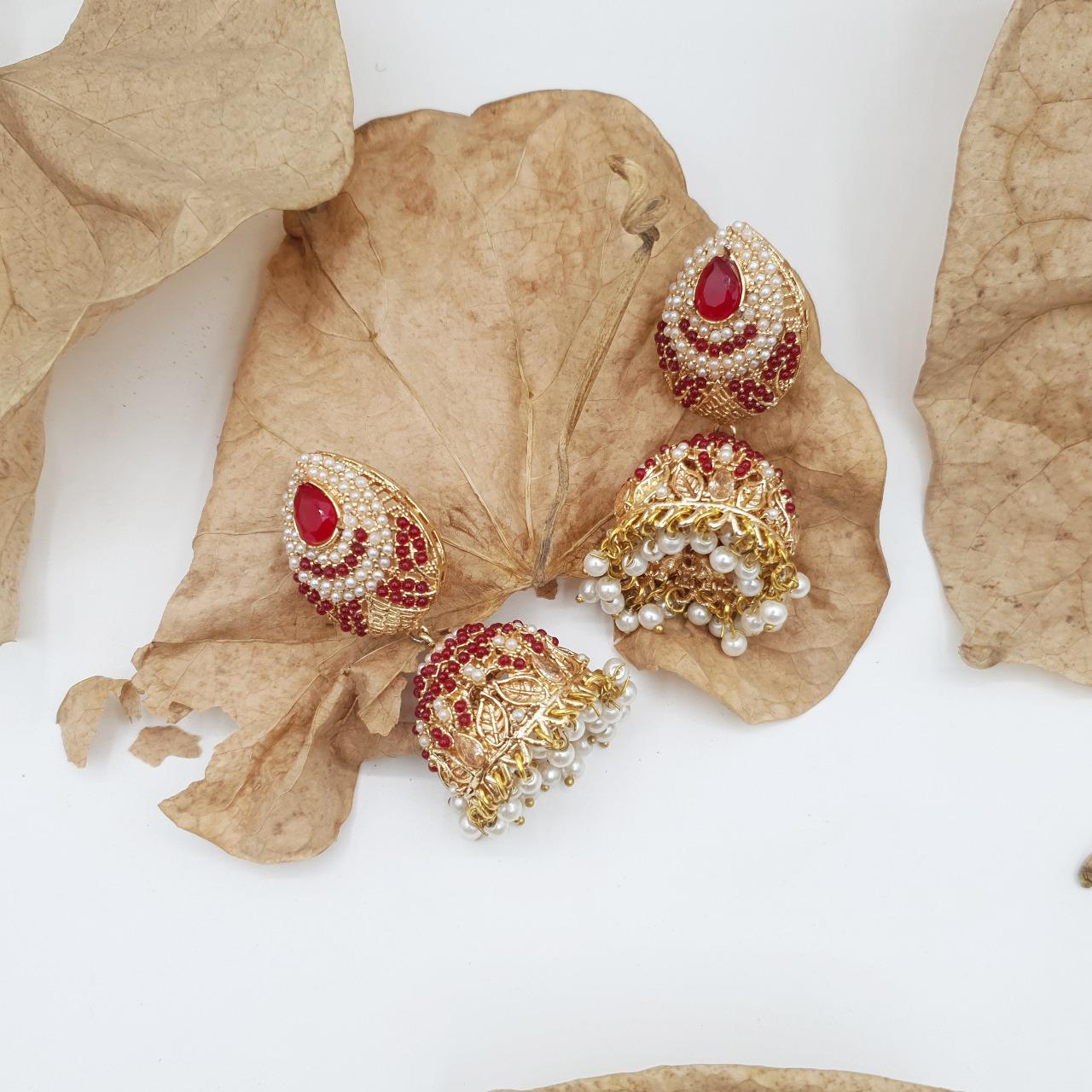 Discover timeless elegance with our Regal Pearldrop Jhumka Collection image 4