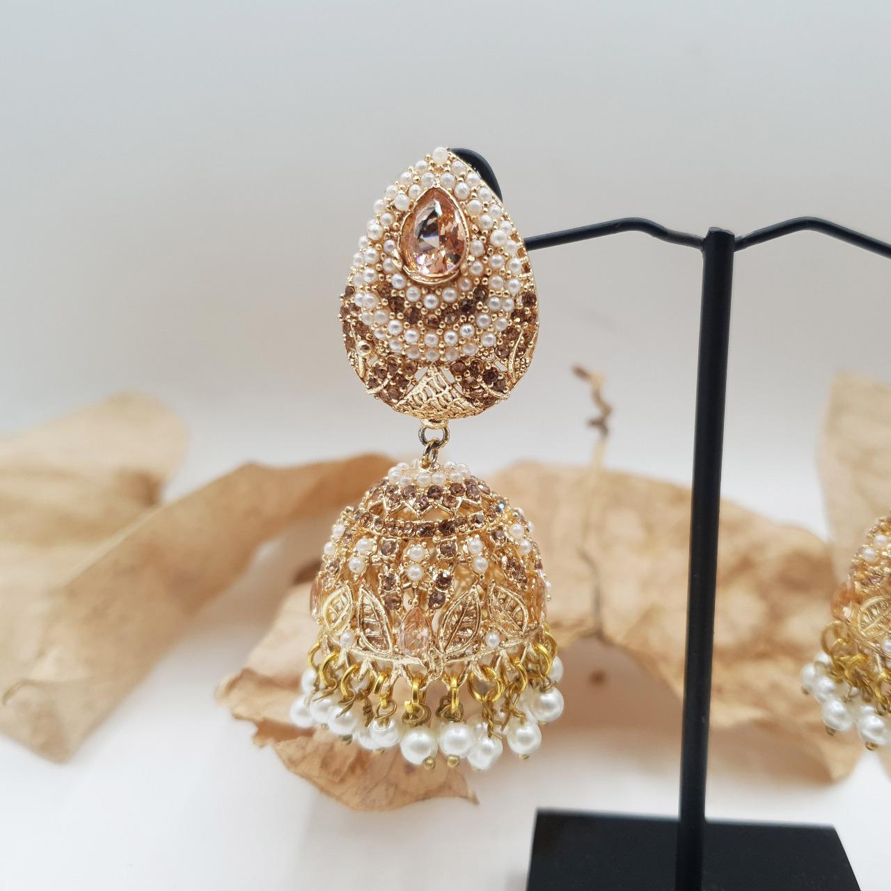 Discover timeless elegance with our Regal Pearldrop Jhumka Collection image 2