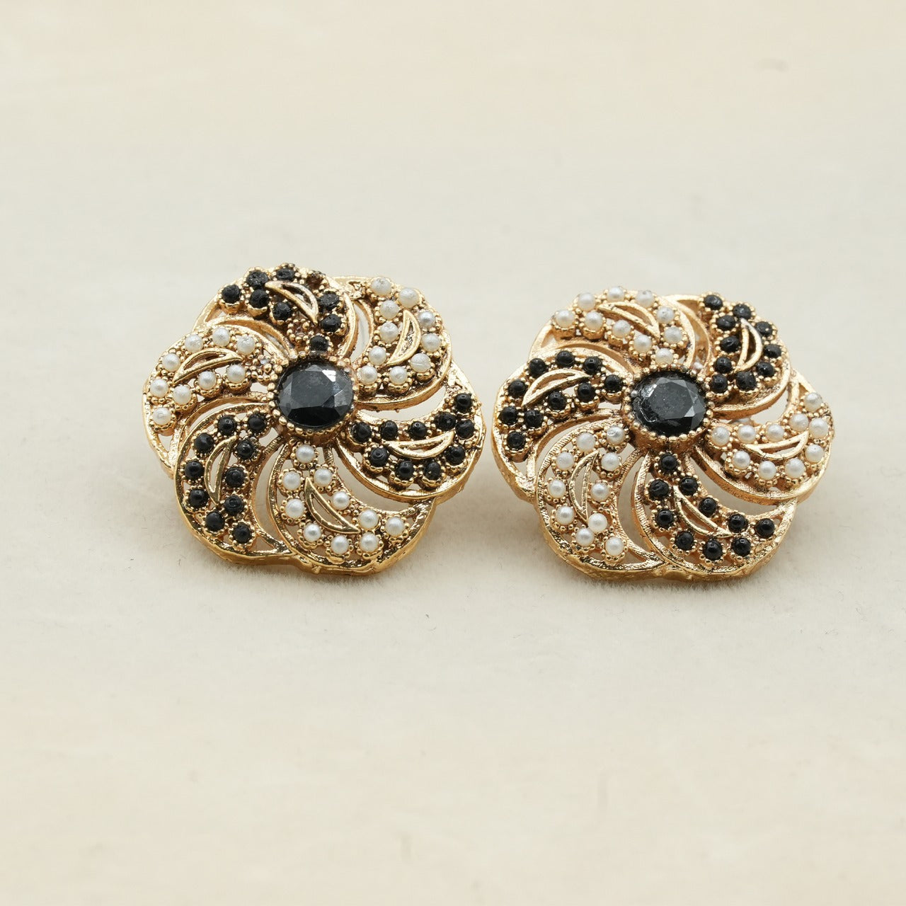 Likely gold-plated metal with a detailed filigree design image 3