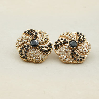 Likely gold-plated metal with a detailed filigree design image 3