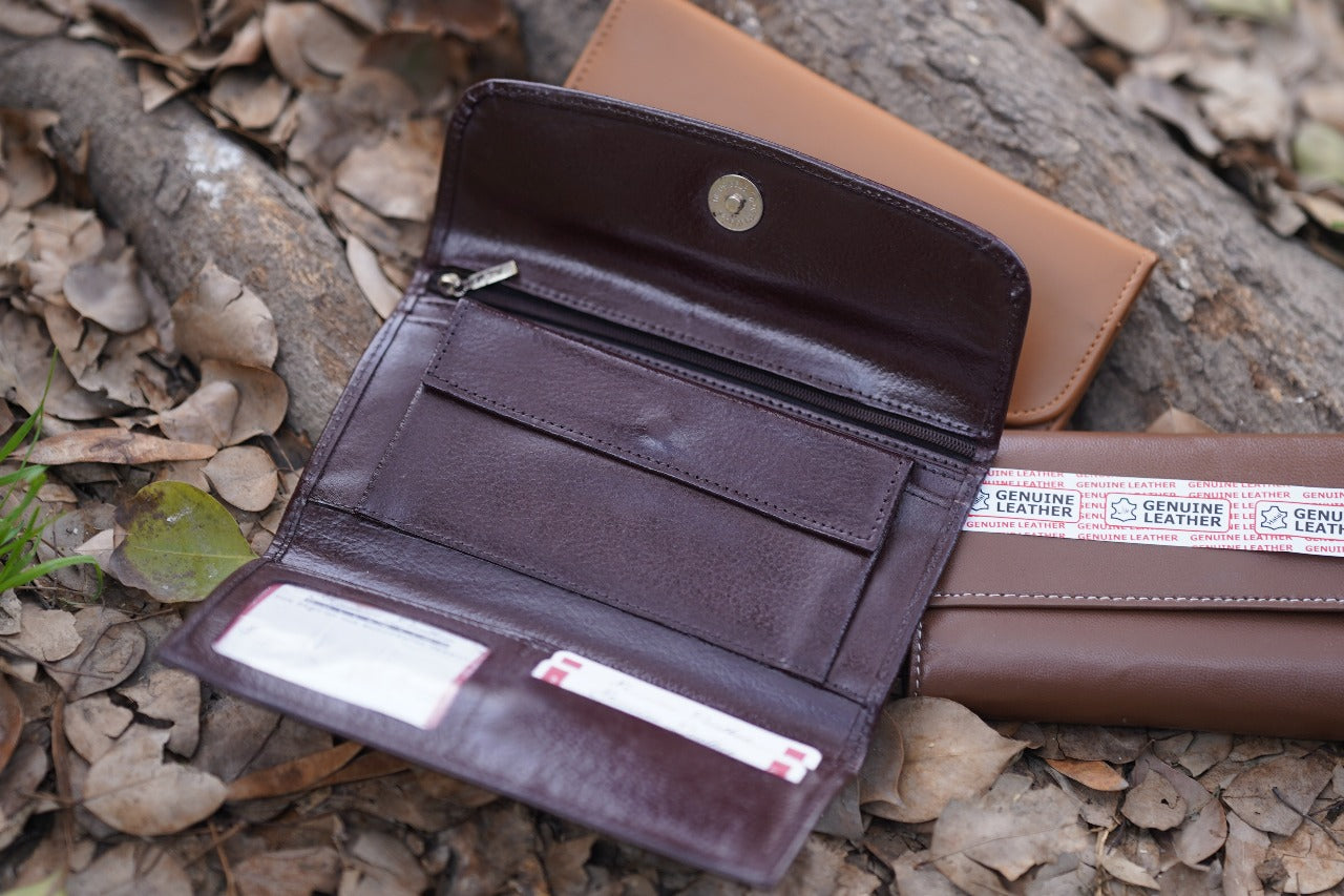 A Stylish and minimalistic genuine leather clutch with a smooth finish and curved flap design, perfect for any occasion image 7