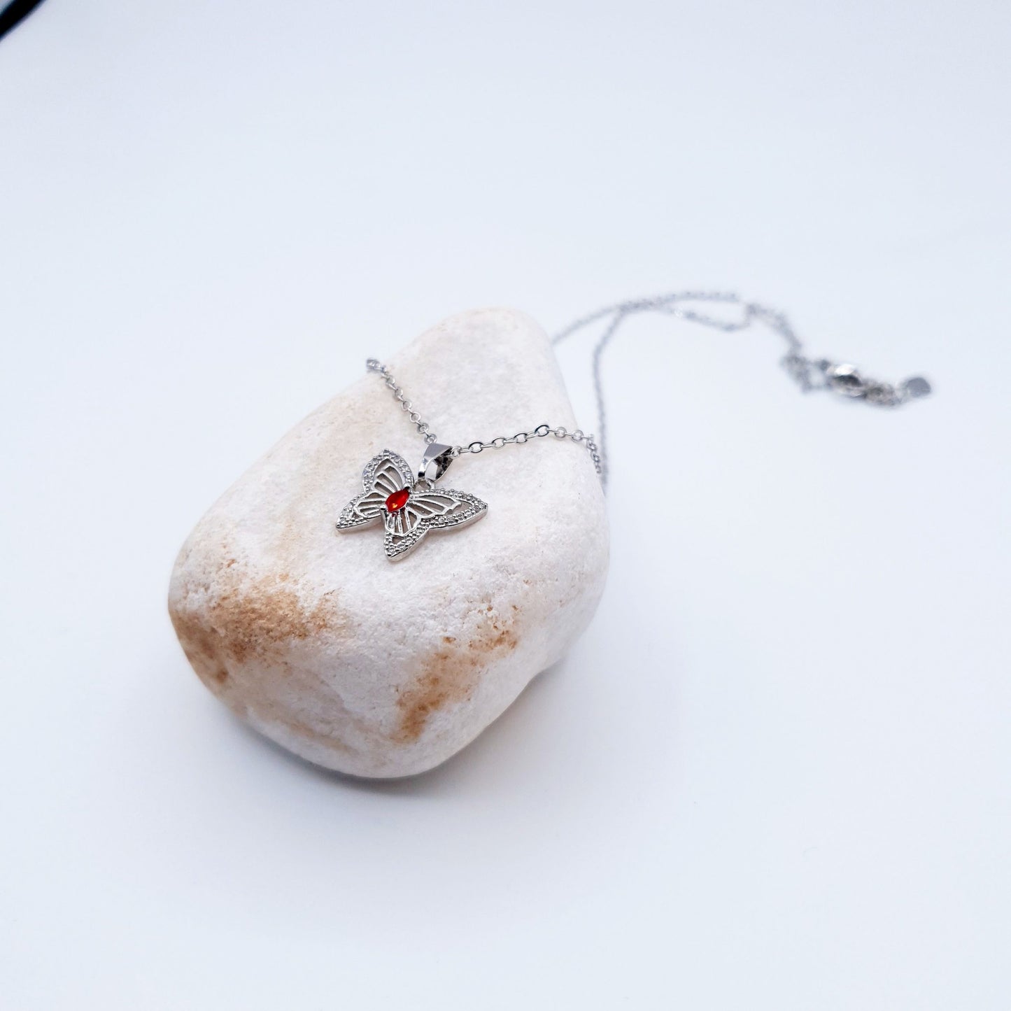 butterfly pendant with a radiant red gem pairs beautifully with matching ear studs image 2