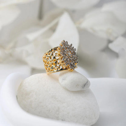 GOLDEN RING WITH SILVER STONES image 0