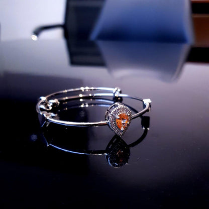 A delicate bracelet featuring a charming design accented with sparkling white stones. image 1