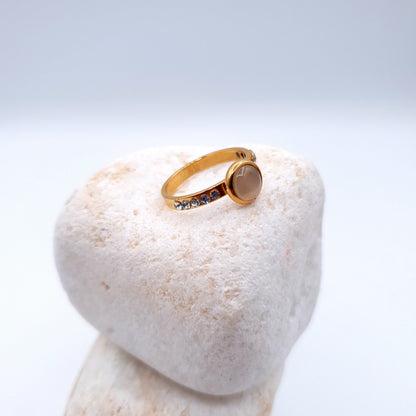 A sleek and elegant ring designed to complement the beauty of a sophisticated person image 1