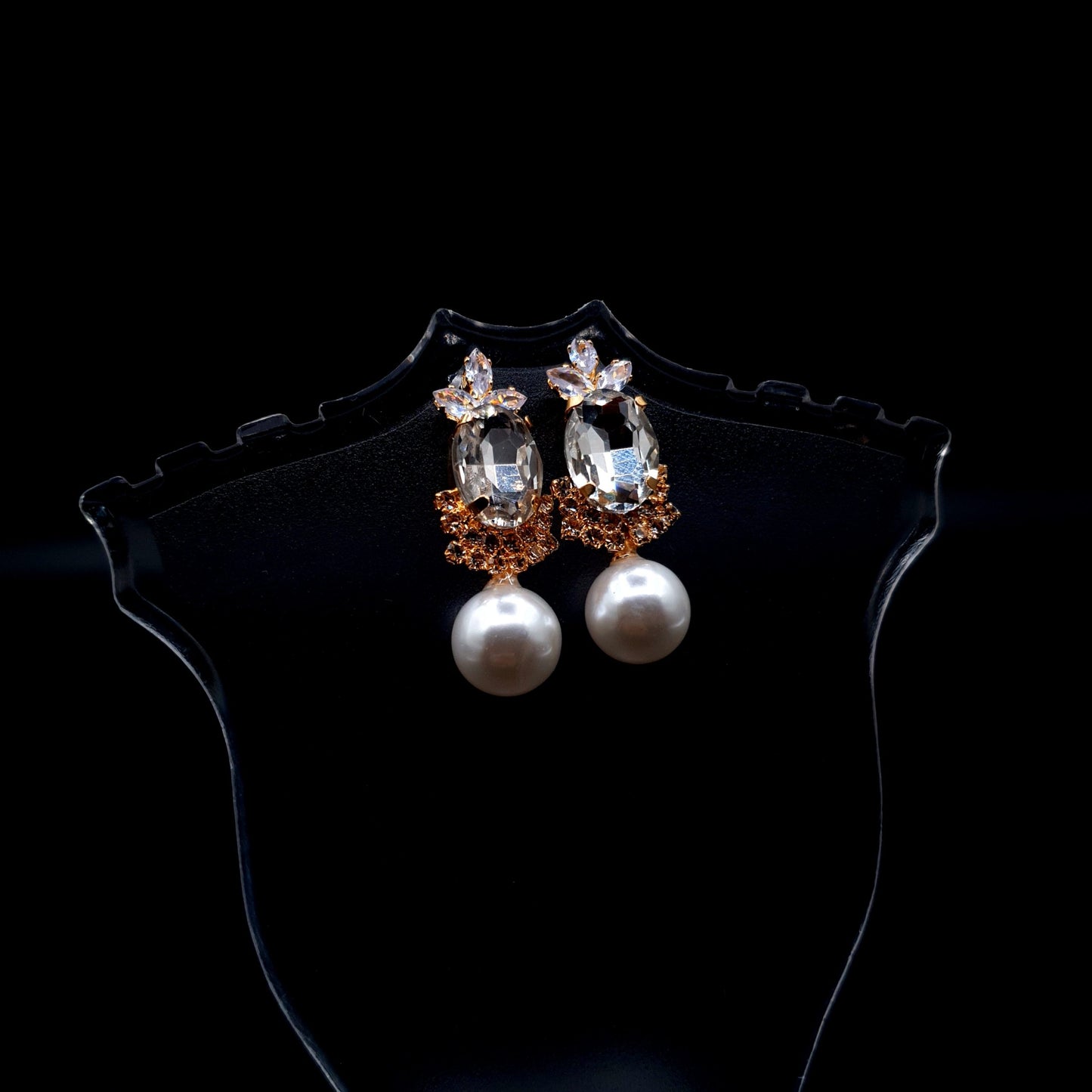 Stunning rhinestone earrings with a graceful drop-down pearl for a timeless and elegant charm.(Silver = 1, Champagne = 1) image 1