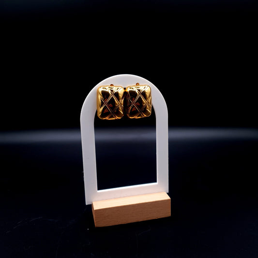 Sleek stainless steel square-shaped tops with a luxurious golden finish for a bold, modern look. image 1