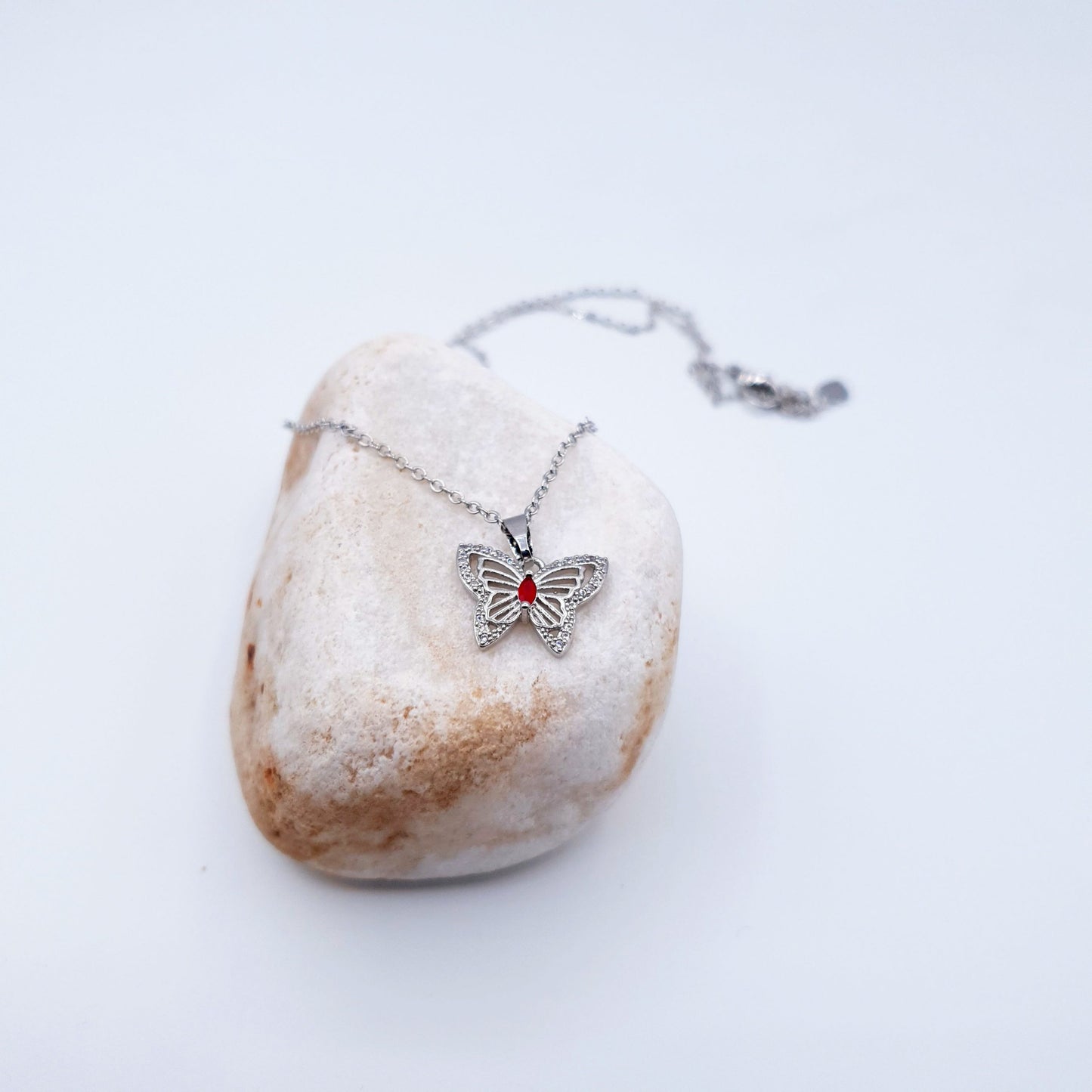 butterfly pendant with a radiant red gem pairs beautifully with matching ear studs image 1