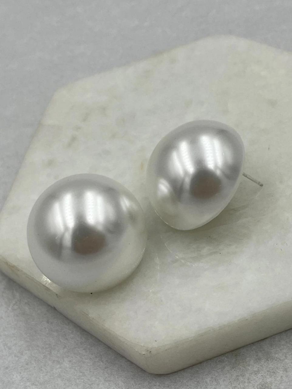 Elegant pearl stud add a timeless touch of sophistication to any outfit image 4