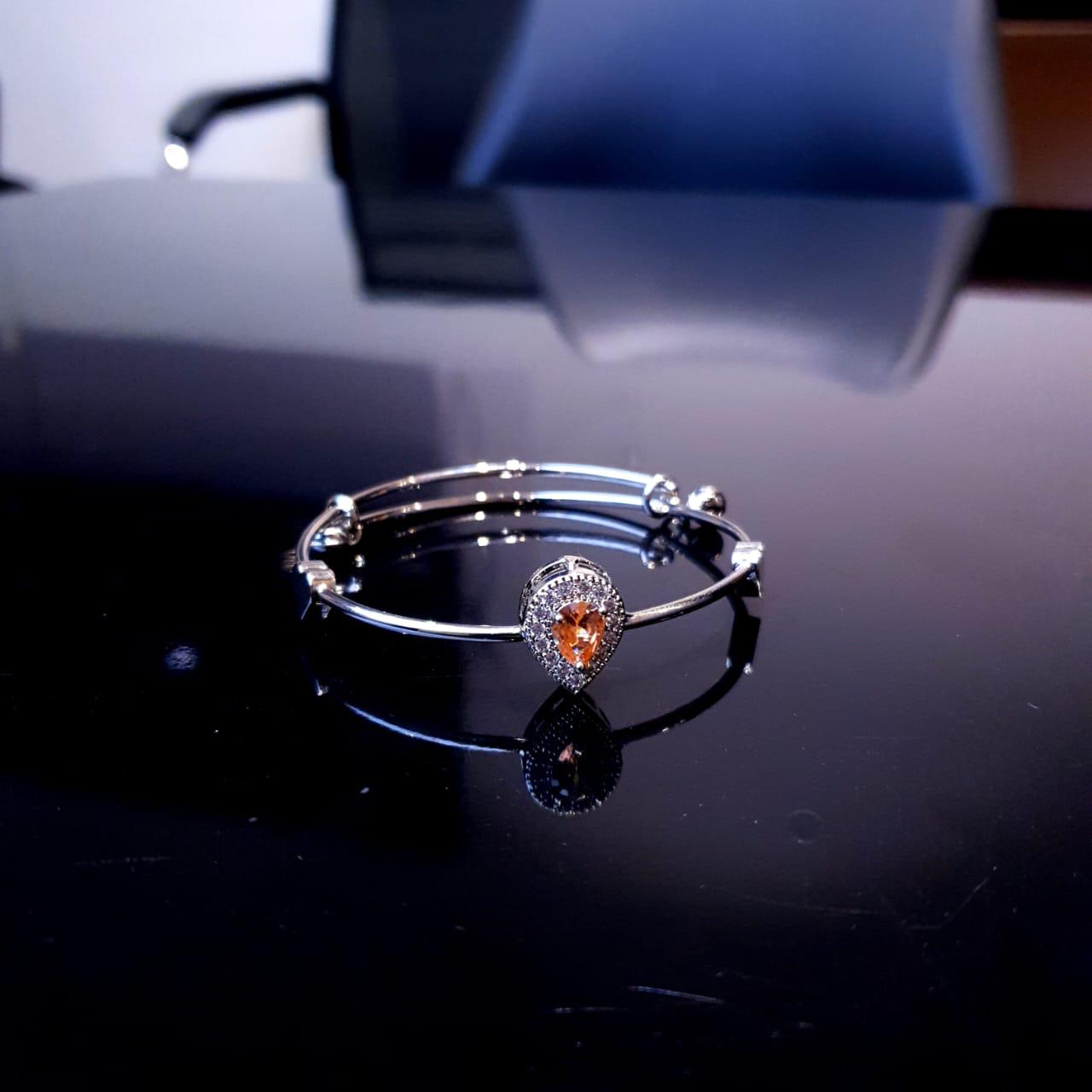 A delicate bracelet featuring a charming design accented with sparkling white stones. image 2